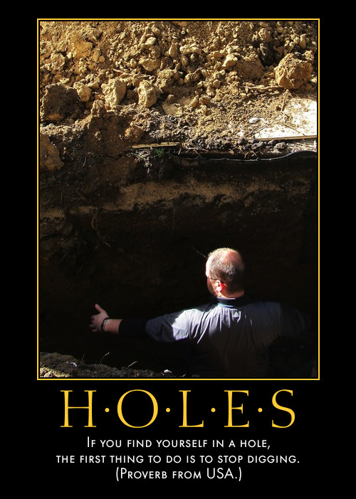 man in deep hole